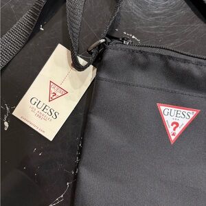 GUESS Black Belt Bag with Red Logo Triangle